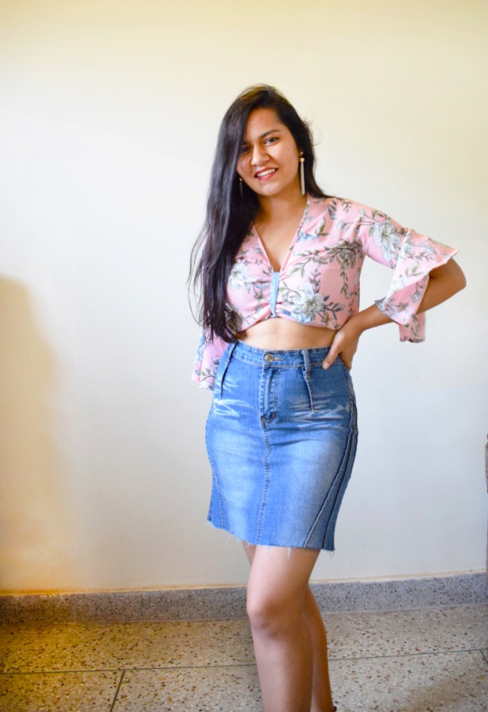 Cute floral top styled with denim skirt